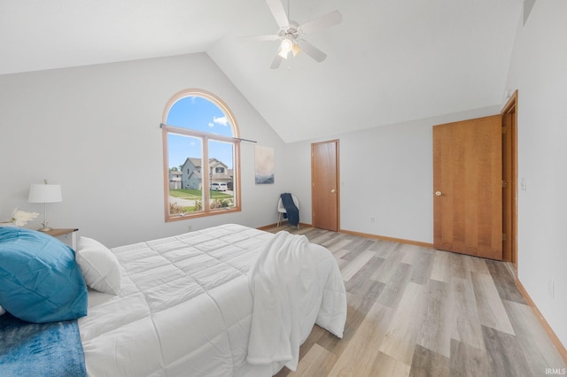 2319 Autumn Lake Pl, Fort Wayne, IN 46818 - bedroom with light wood finished floors, a ceiling fan, and high vaulted ceiling