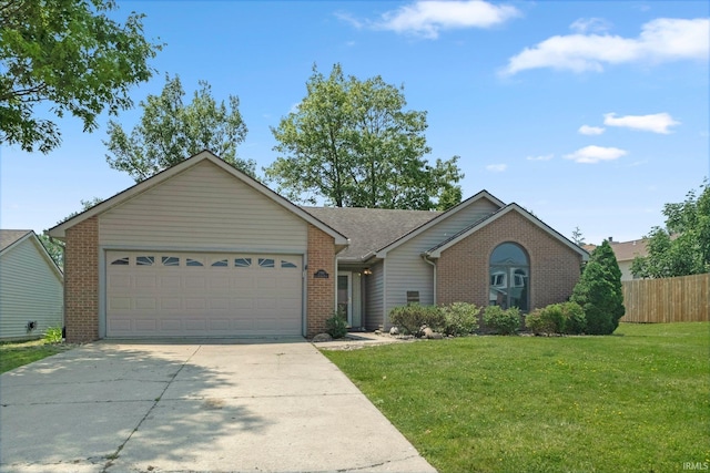 2319 Autumn Lake Pl, Fort Wayne, IN 46818 - single story home featuring brick siding, a garage, and driveway