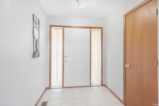 2319 Autumn Lake Pl, Fort Wayne, IN 46818 - entryway with baseboards and light tile patterned flooring