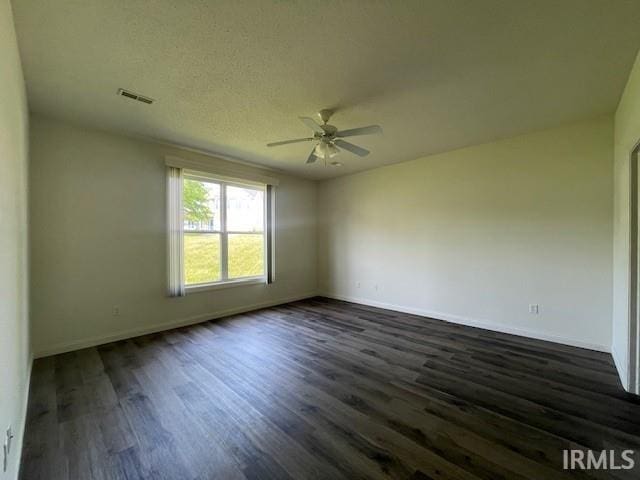 3239 S Parnel Ct, Bloomington, IN 47403 - unfurnished room featuring ceiling fan and dark wood-style floors