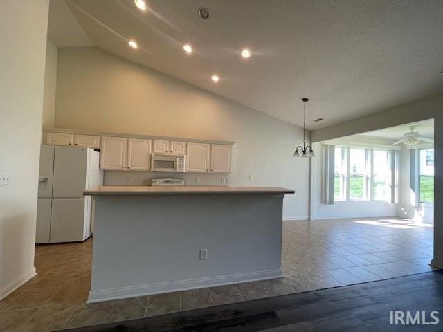 3239 S Parnel Ct, Bloomington, IN 47403 - kitchen featuring white appliances, open floor plan, a center island, white cabinetry, and pendant lighting