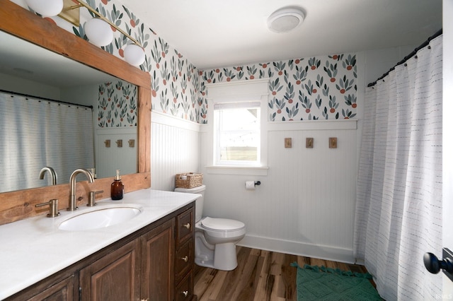 5157 N County Rd 850 W, Mulberry, IN 46058 - full bathroom featuring vanity, wood finished floors, wainscoting, and wallpapered walls