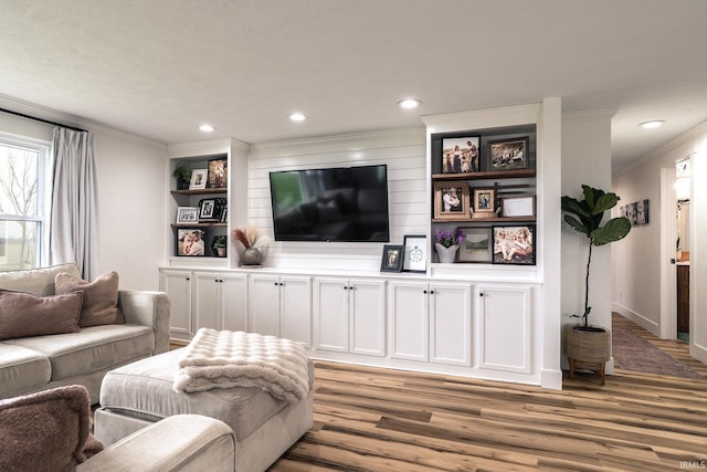 5157 N County Rd 850 W, Mulberry, IN 46058 - living area with crown molding, light wood finished floors, recessed lighting, and built in features