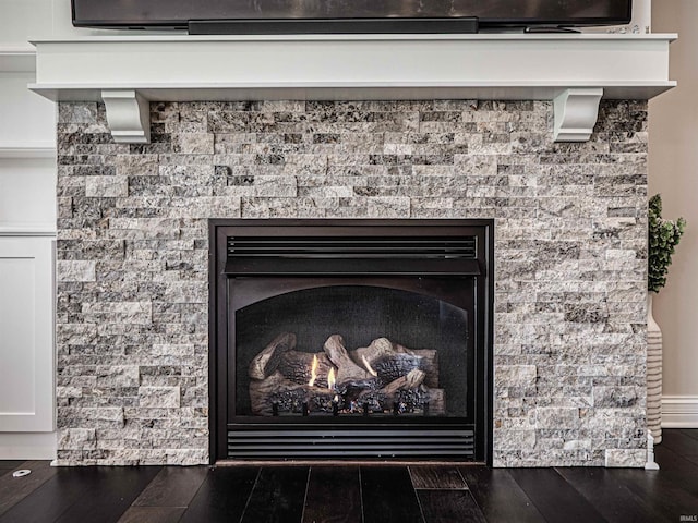 4261 Martha Ct, Newburgh, IN 47630 - detailed view of wood finished floors and a lit fireplace