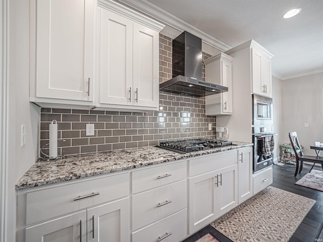 4261 Martha Ct, Newburgh, IN 47630 - kitchen featuring wall chimney exhaust hood, appliances with stainless steel finishes, ornamental molding, white cabinets, and backsplash