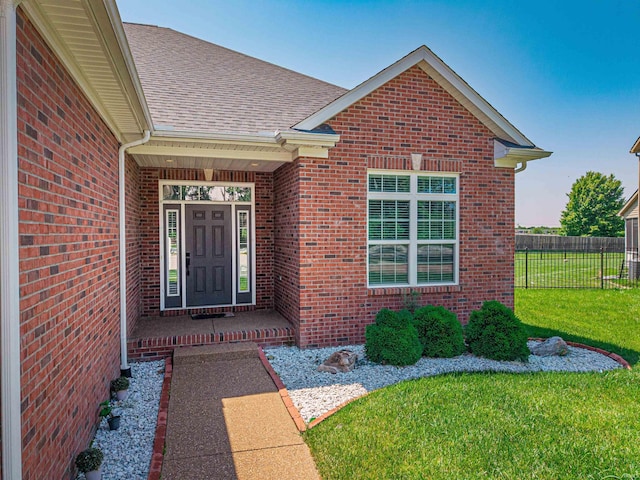 4261 Martha Ct, Newburgh, IN 47630 - entrance to property with a shingled roof and brick siding