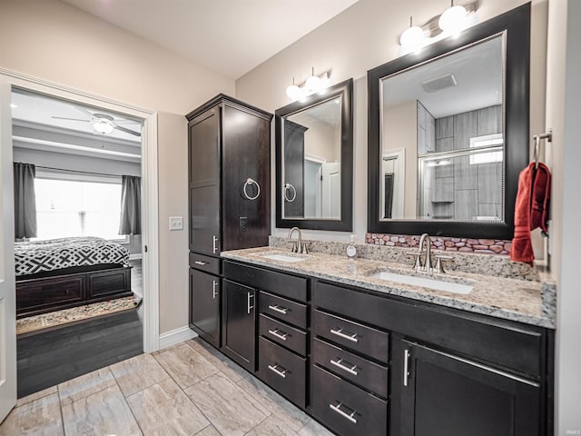 4261 Martha Ct, Newburgh, IN 47630 - bathroom with double vanity and baseboards