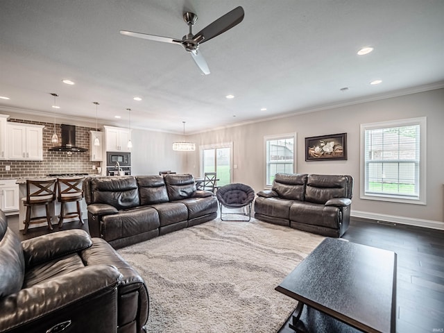 4261 Martha Ct, Newburgh, IN 47630 - living area featuring a ceiling fan, recessed lighting, dark wood-style floors, and ornamental molding