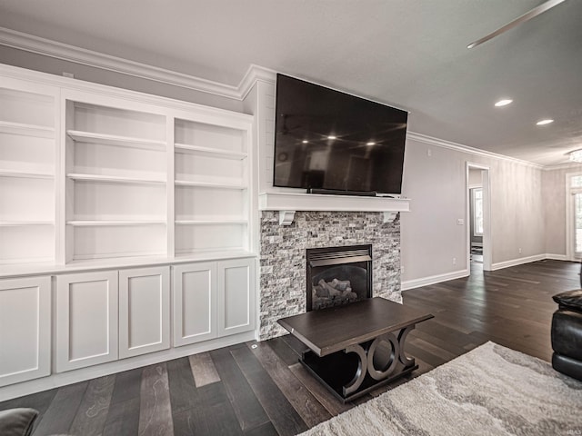4261 Martha Ct, Newburgh, IN 47630 - living area with ornamental molding, dark wood finished floors, a fireplace, recessed lighting, and built in features