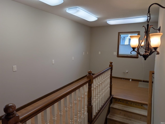 1260 Carrington Way, Berne, IN 46711 - stairs with a chandelier and baseboards