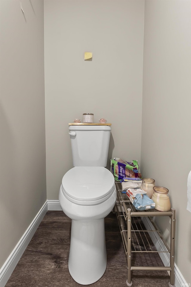 773 Sycamore St, Decatur, IN 46733 - bathroom featuring wood finished floors and toilet