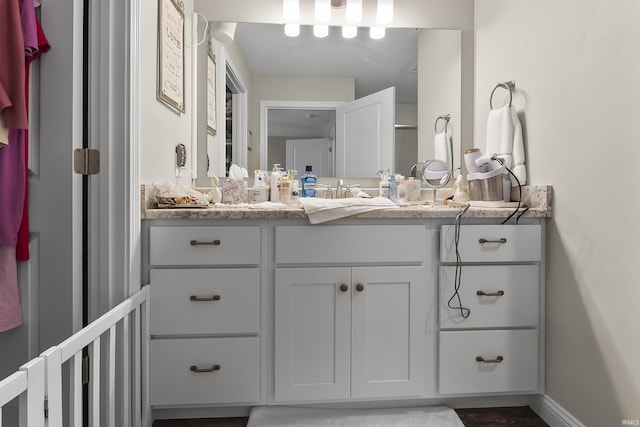 773 Sycamore St, Decatur, IN 46733 - bathroom with vanity and baseboards