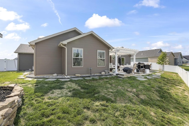 773 Sycamore St, Decatur, IN 46733 - back of property with a pergola, a fenced backyard, a patio, and a gate