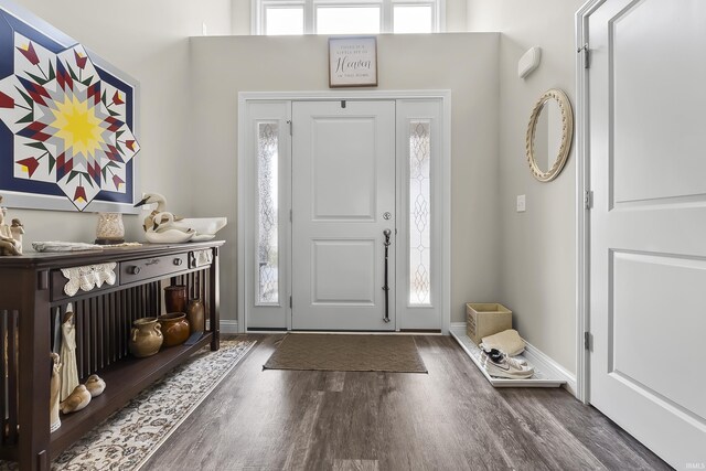 773 Sycamore St, Decatur, IN 46733 - entryway featuring wood finished floors and a towering ceiling