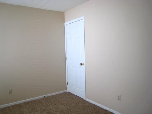 52289 Wembley Dr, South Bend, IN 46637 - carpeted empty room with baseboards