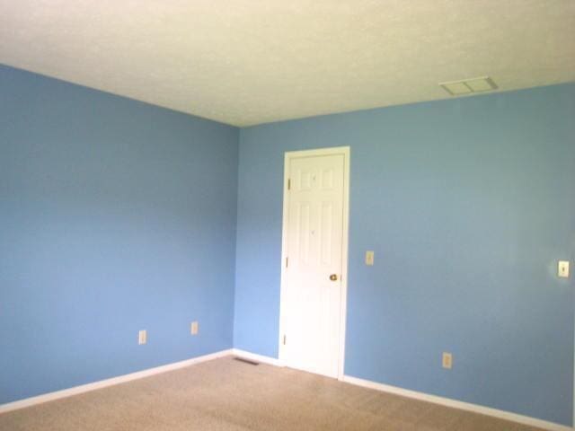 52289 Wembley Dr, South Bend, IN 46637 - spare room with baseboards and carpet floors