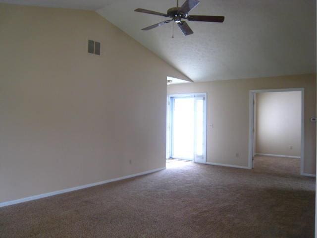 52289 Wembley Dr, South Bend, IN 46637 - unfurnished room with carpet, ceiling fan, and lofted ceiling