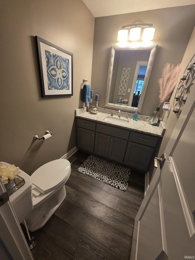 1051 Morningstar Rd, Auburn, IN 46706 - half bath featuring wood finished floors and vanity