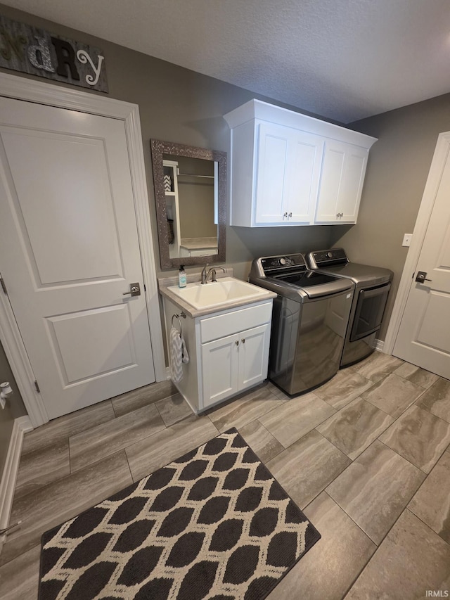1051 Morningstar Rd, Auburn, IN 46706 - washroom featuring cabinet space, washing machine and dryer, and wood finish floors