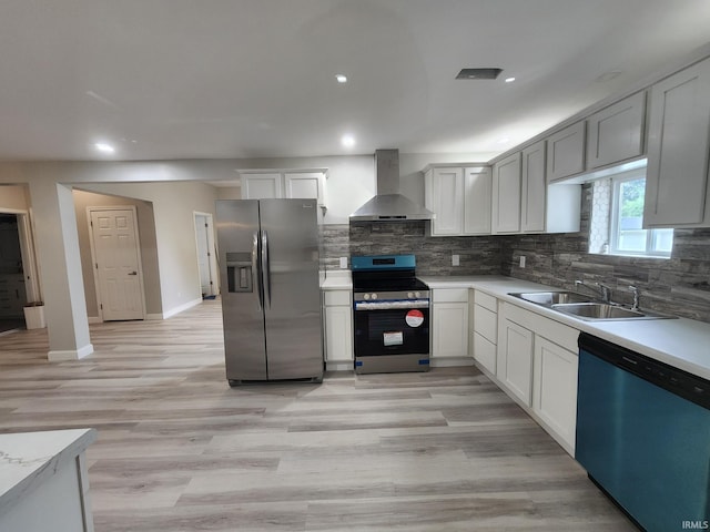 1584 Snyder St, Wabash, IN 46992 - kitchen with stainless steel appliances, wall chimney range hood, tasteful backsplash, light countertops, and recessed lighting