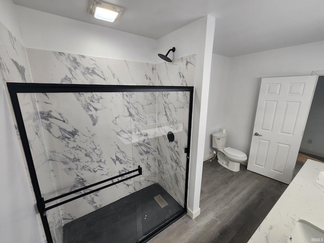 1584 Snyder St, Wabash, IN 46992 - bathroom featuring a marble finish shower, wood finished floors, and double vanity