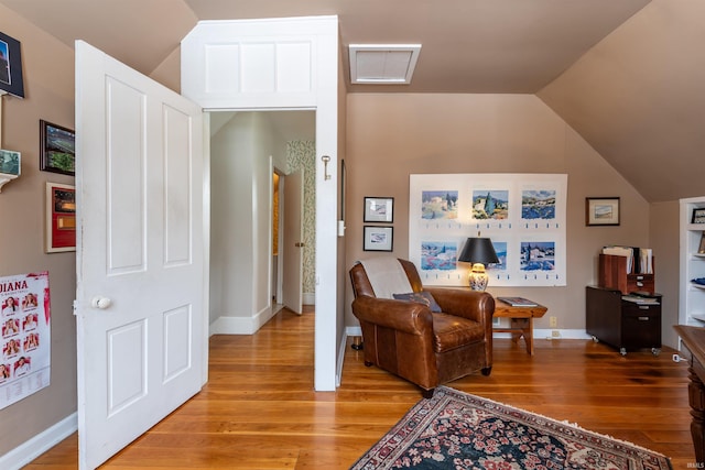 921 S Sheridan Dr, Bloomington, IN 47401 - sitting room featuring light wood finished floors and lofted ceiling