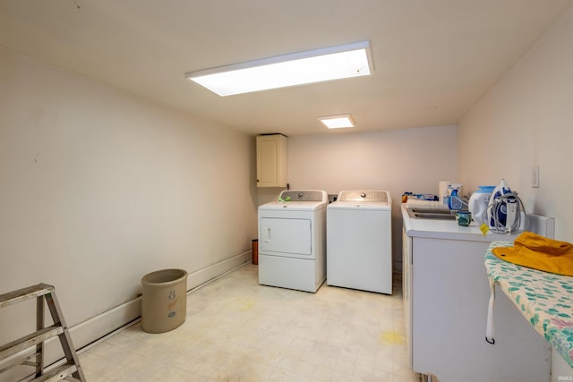921 S Sheridan Dr, Bloomington, IN 47401 - laundry room with cabinet space, separate washer and dryer, and light floors