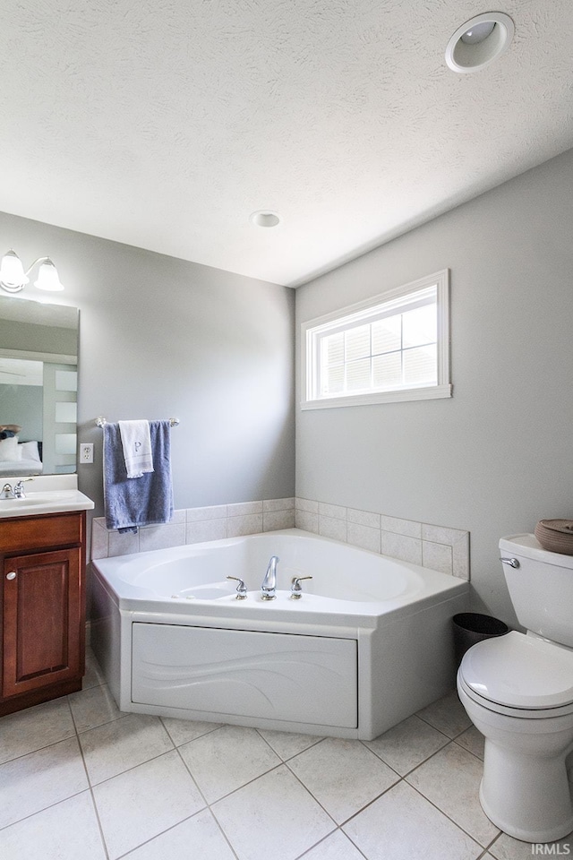 2123 Bunker Ln, Evansville, IN 47725 - full bath with a garden tub, vanity, tile patterned flooring, and a textured ceiling