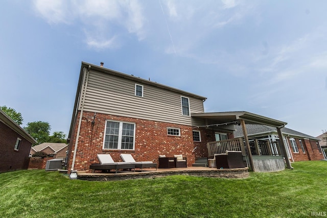 2123 Bunker Ln, Evansville, IN 47725 - rear view of property with brick siding, a patio area, a yard, and an outdoor hangout area