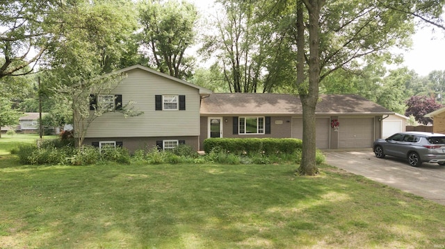 8255 Heather Dr, Newburgh, IN 47630 - tri-level home with a front lawn, an attached garage, driveway, and brick siding