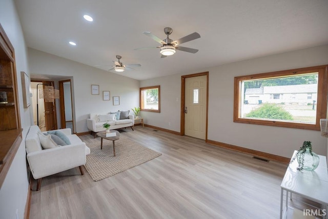3529 S Walnut St, Muncie, IN 47304 - living room with light wood-type flooring, a ceiling fan, lofted ceiling, and recessed lighting