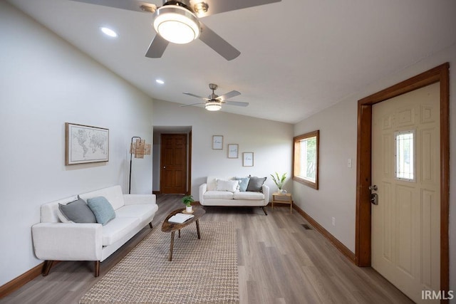 3529 S Walnut St, Muncie, IN 47304 - living area featuring vaulted ceiling, light wood-style flooring, ceiling fan, and recessed lighting