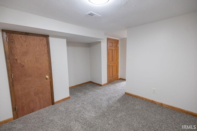 3529 S Walnut St, Muncie, IN 47304 - finished basement featuring carpet floors and a textured ceiling