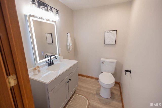 3529 S Walnut St, Muncie, IN 47304 - half bathroom featuring wood finished floors and vanity