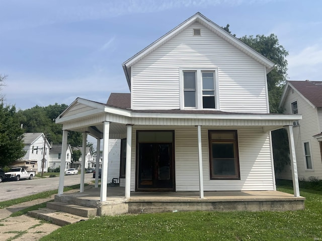 1200 Hartford St, Lafayette, IN 47904 - view of front of house featuring a porch and roof with shingles