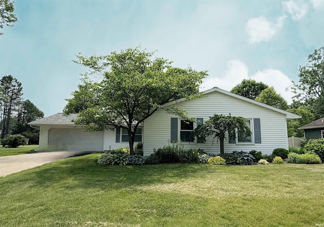 1504 Hillcrest St, North Manchester, IN 46962 - ranch-style house featuring a front lawn, an attached garage, and driveway