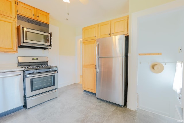 425 Gernhart Ave, Mishawaka, IN 46544 - kitchen featuring stainless steel appliances, light brown cabinetry, light countertops, and ceiling fan