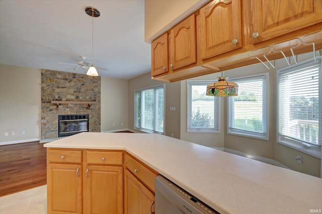 9109 S Front Nine Dr, Bloomington, IN 47401 - kitchen with a ceiling fan, light countertops, open floor plan, decorative light fixtures, and light tile patterned floors