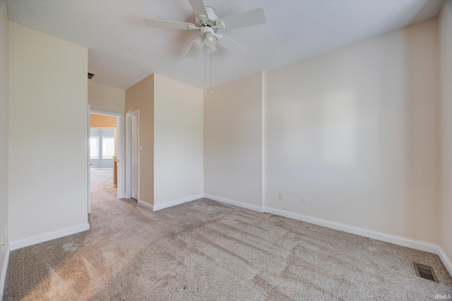 9109 S Front Nine Dr, Bloomington, IN 47401 - carpeted spare room with a ceiling fan and baseboards