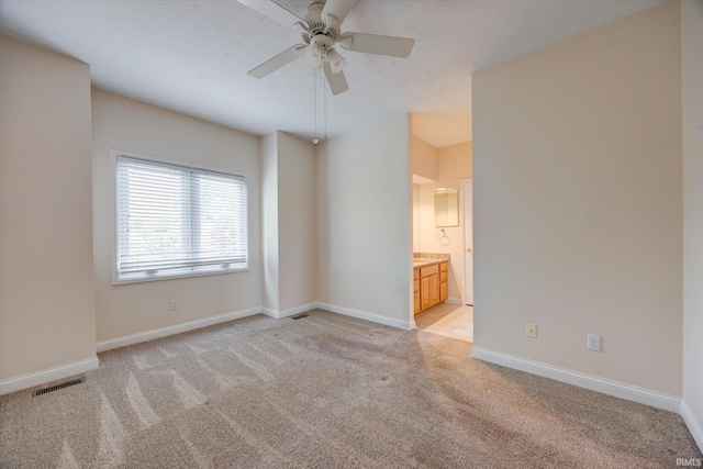 9109 S Front Nine Dr, Bloomington, IN 47401 - empty room with light carpet and a ceiling fan