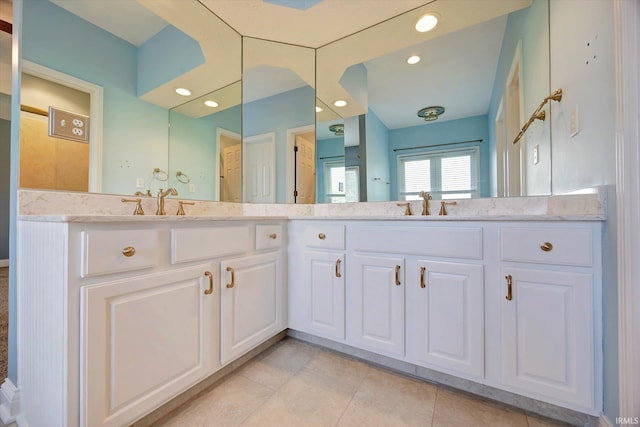 9109 S Front Nine Dr, Bloomington, IN 47401 - bathroom featuring double vanity, tile patterned floors, and recessed lighting