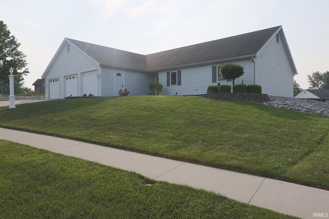 327 Hillside Ave, Roanoke, IN 46783 - ranch-style home with a front lawn, an attached garage, and driveway