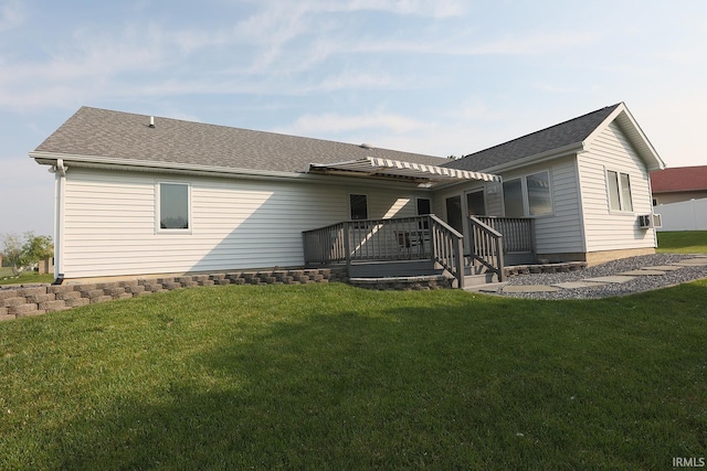 327 Hillside Ave, Roanoke, IN 46783 - rear view of house featuring a deck, a yard, and a shingled roof