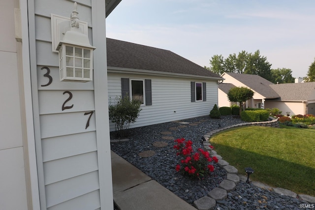 327 Hillside Ave, Roanoke, IN 46783 - view of property exterior with a yard and roof with shingles
