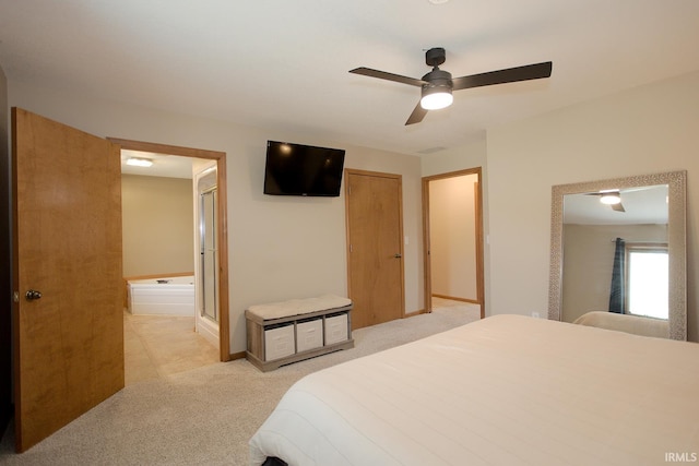 327 Hillside Ave, Roanoke, IN 46783 - bedroom featuring light colored carpet, connected bathroom, and ceiling fan
