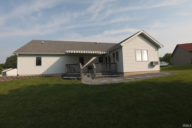 327 Hillside Ave, Roanoke, IN 46783 - rear view of house featuring a deck, a lawn, cooling unit, and roof with shingles
