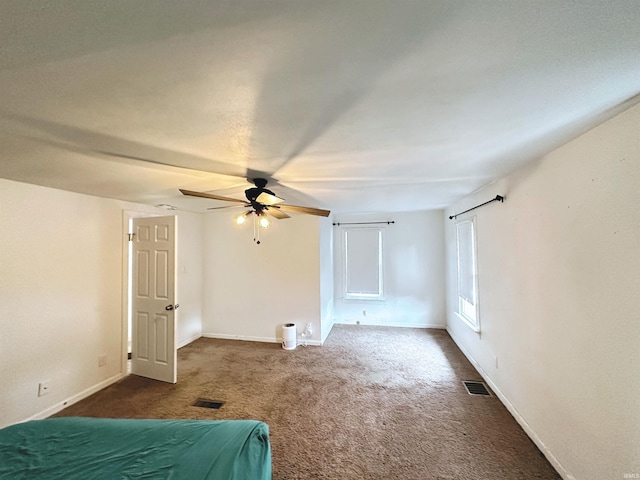 2023 E Columbia St, Evansville, IN 47711 - unfurnished bedroom featuring carpet and a ceiling fan