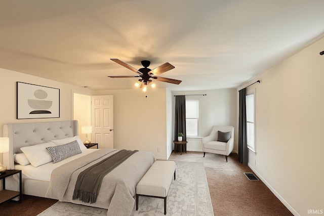 2023 E Columbia St, Evansville, IN 47711 - carpeted bedroom with a ceiling fan and baseboards