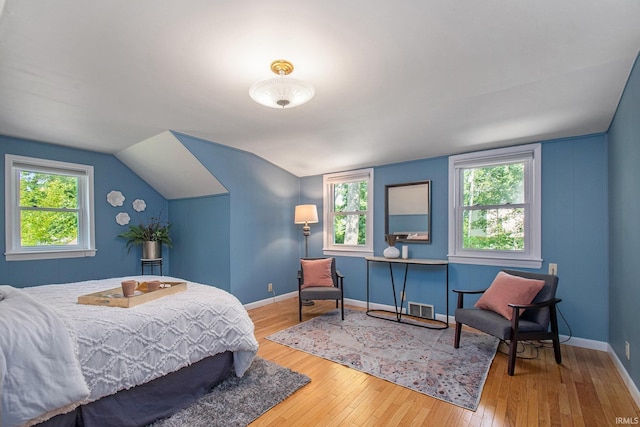 1730 Oak Park Dr, South Bend, IN 46617 - bedroom featuring wood-type flooring and vaulted ceiling