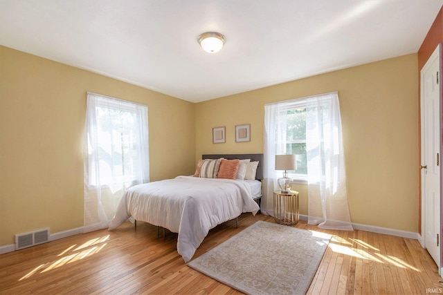 1730 Oak Park Dr, South Bend, IN 46617 - bedroom featuring light wood-style floors and baseboards